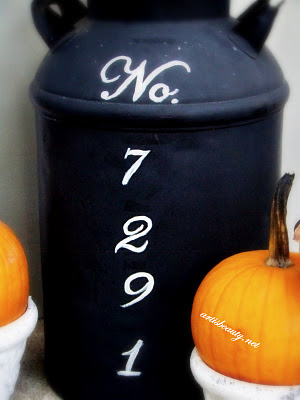 Old Milk Can turned Address Marker